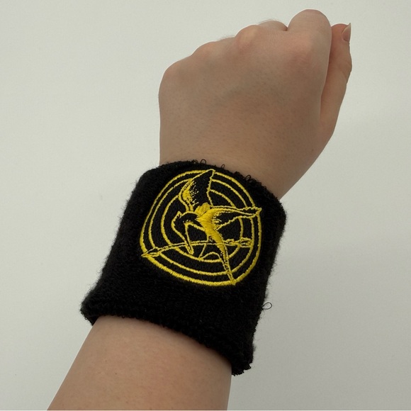 The Hunger Games Logo & Mockingjay Terrycloth Wristband - Picture 1 of 4
